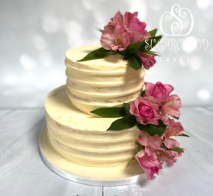 A Semi-Naked Vanilla Cake Decorated With Fresh Flowers, Nantwich