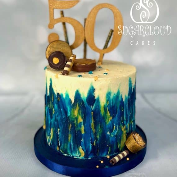 A blue and gold themed 50th birthday cake, Nantwich